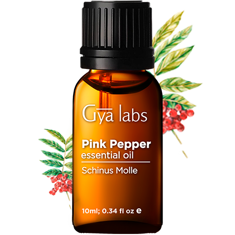 pink pepper plant with pink pepper oil bottle